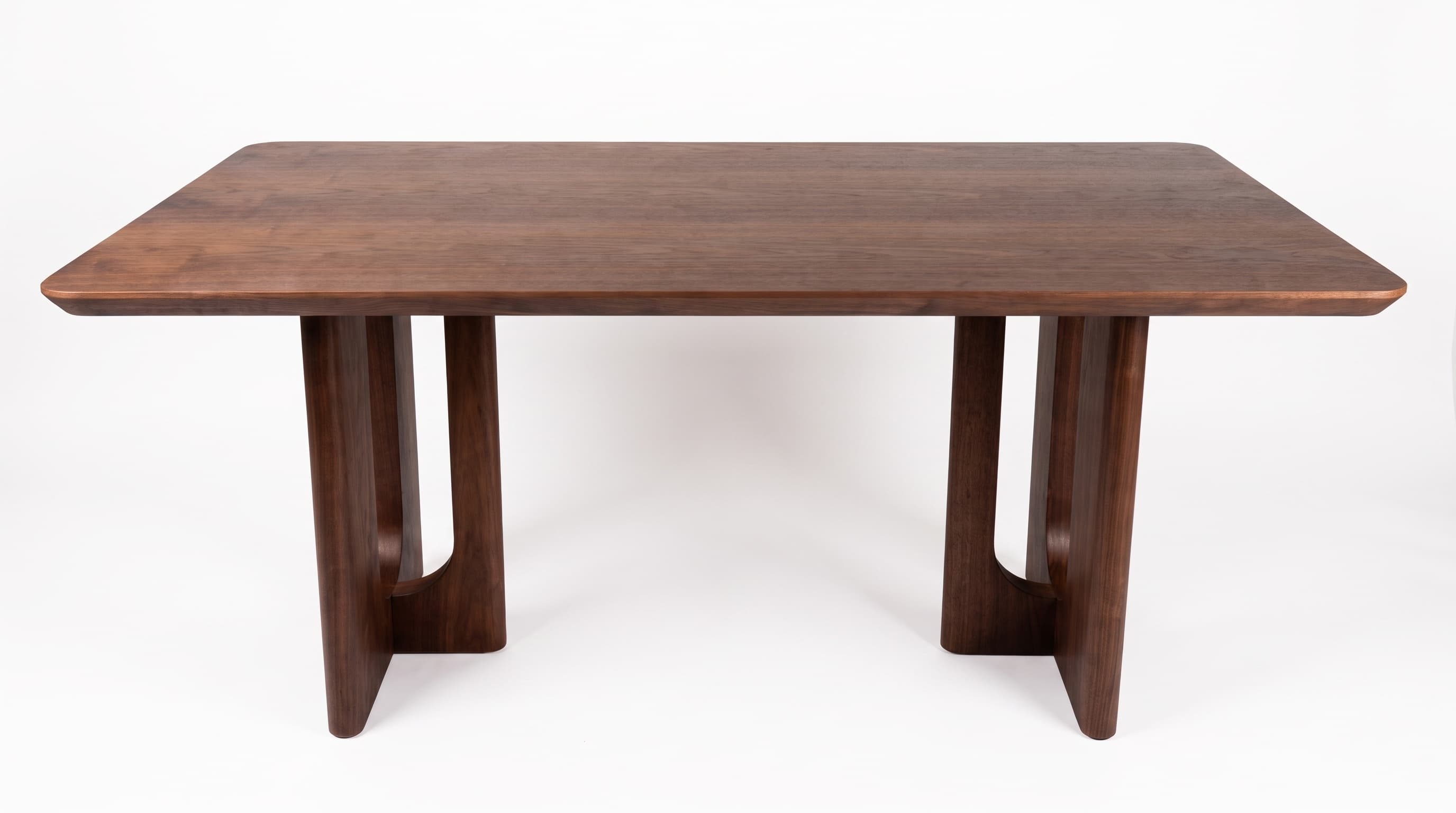 62.9-inch rectangular solid wood dining table; a minimalist, modern design suitable for kitchens, dining rooms and living rooms, in walnut finish